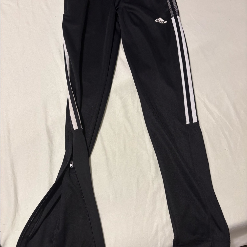 Adidas woman’s Black Joggers with White Stripes